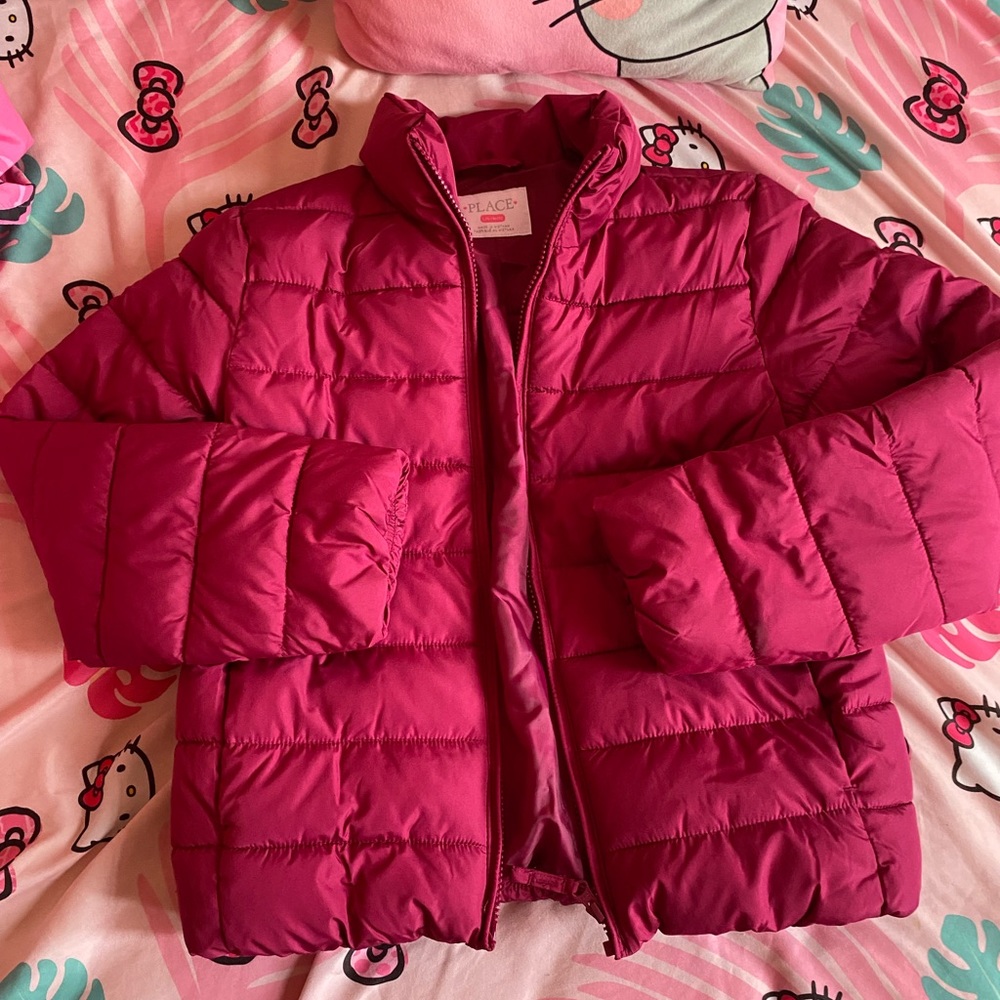 Barely used burgundy puffer jacket.